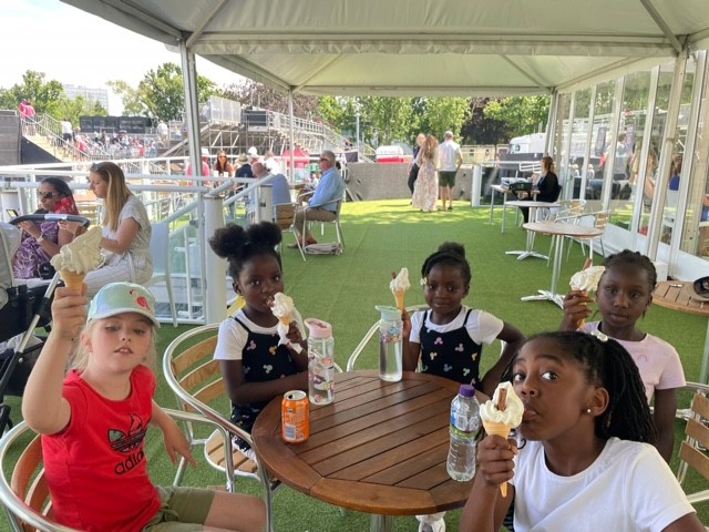 Young players enjoying ice creams