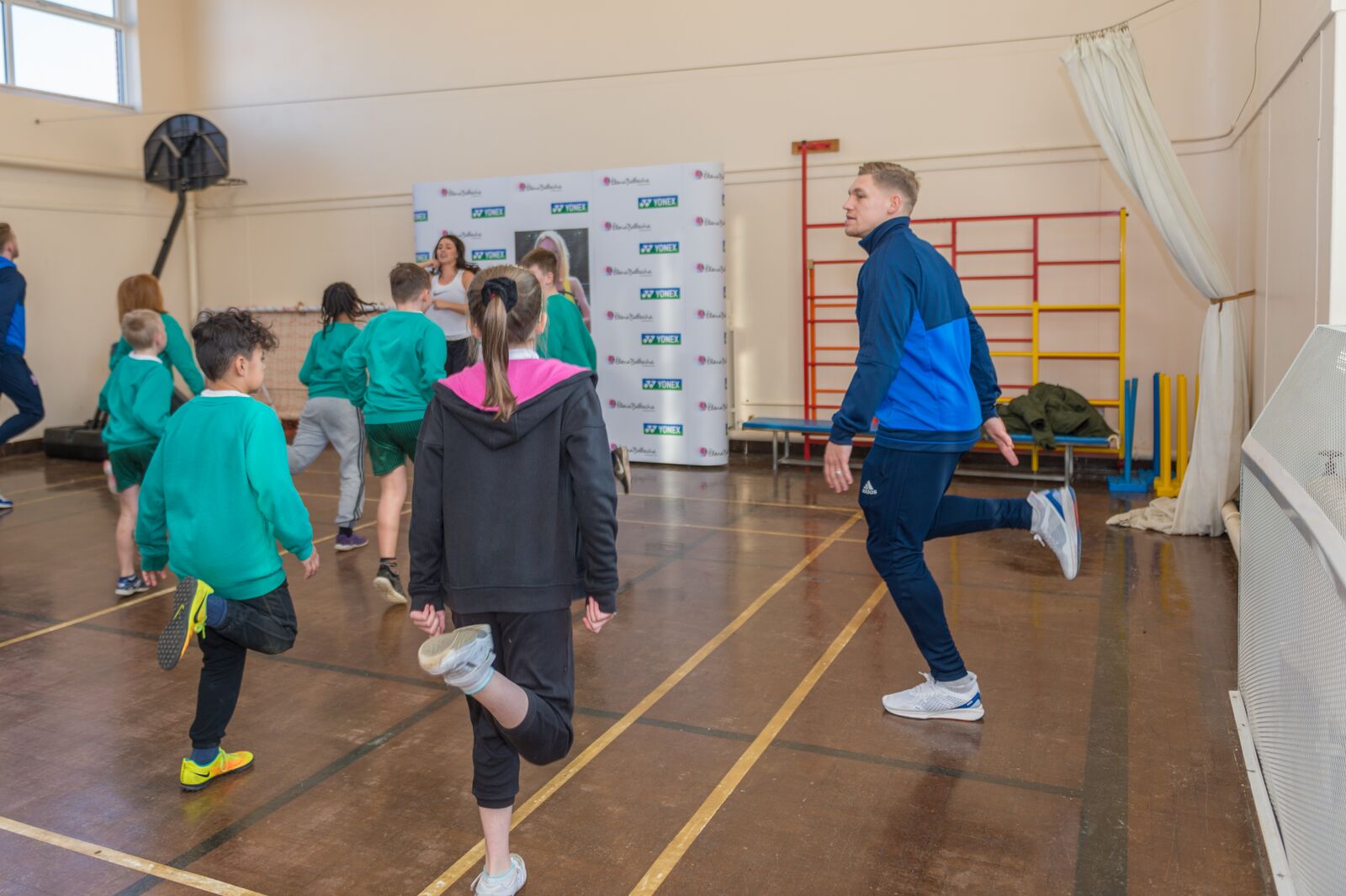 Martyn Waghorn and Leoni taking part in the sports roadshow at Sidegate Primary School, Ipswich.